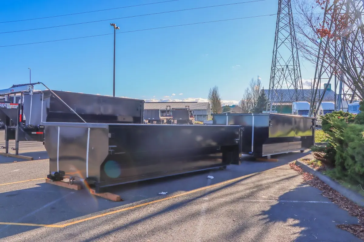 Roll-off dumpster ready for waste disposal at job site for Construction Dumpster Rental in Delta